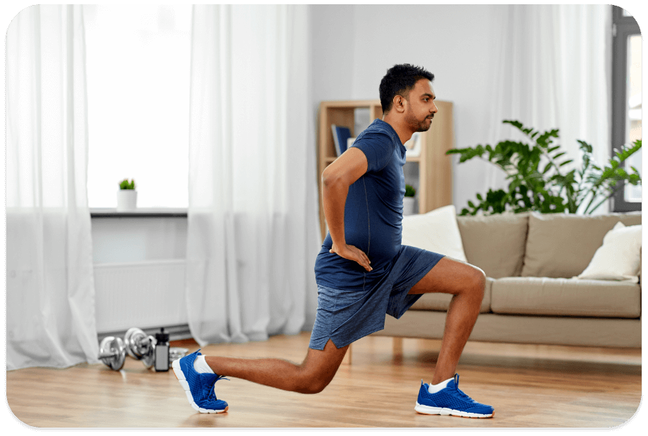 Man doing a forward lunge.